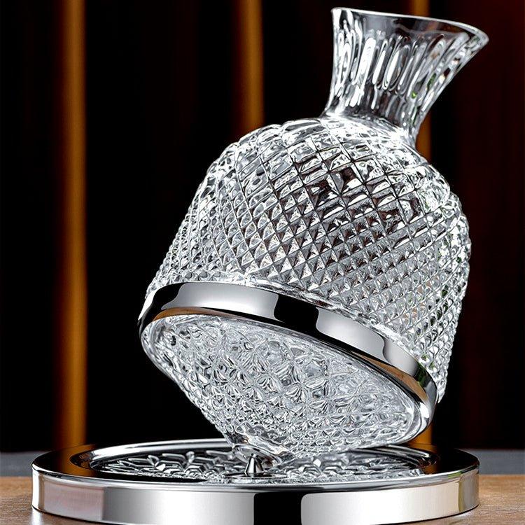 Vitraelle Orbit Decanter rotating on its sculptural base
